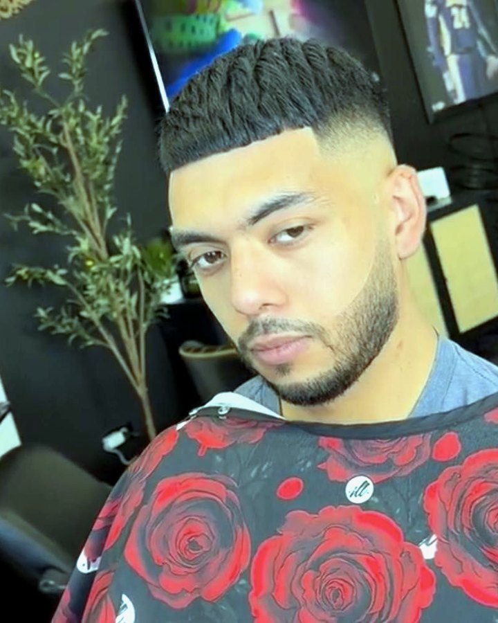 A skin fade and lineup cut by Ramzy